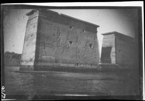 Temple of Isis, partly submerged Gate of Nectanebo in Aswan Dam on Philae Island, Egypt, before relocation, early 20th century [picture] / Rex Nan Kivell