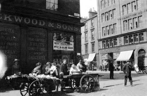 Street scene, selling from barrows in McAlpine Street, Glasgow, Scotland, early 20th century [picture] / Rex Nan Kivell