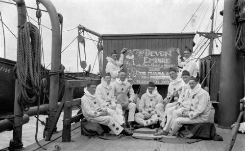 WW1 transport ship, soldiers dressed as Pierrots for an entertainment, 2 June 1917 [picture] / Rex Nan Kivell