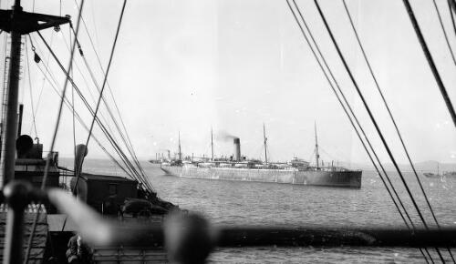 Two ships (WW1 transport ships?) taken from the another ship [picture] / Rex Nan Kivell