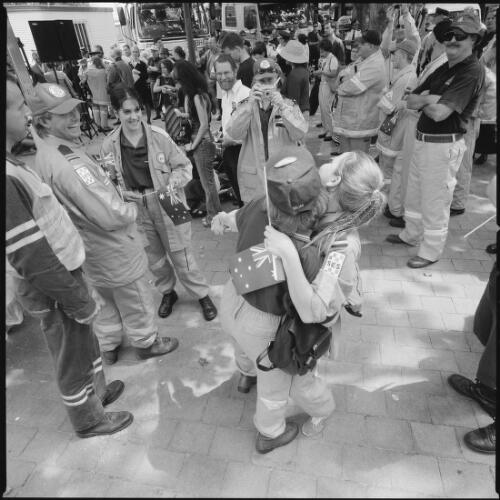 [State Emergency Service personnel celebrating at the firefighters' civic reception, Garema Place, Canberra, 19 February 2002] [picture] / Loui Seselja