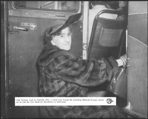Lady Ramsay, back in Australia after a world tour, boards the Australian National Airways' service car to take her from Essendon Aerodrome to Melbourne [picture]