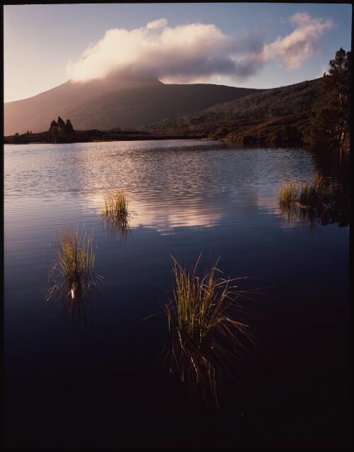 Evening cloud over Barn Bluff, Cradle Mountain-Lake St Clair National Park, 1990, 2 [transparency] / Peter Dombrovskis