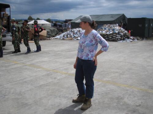 [Sisa DeJesus, AusAID mental health consultant, on the tarmac at Banda Aceh Airport, 11 January 2005] [picture] / AusAID, photographer Robin Davies