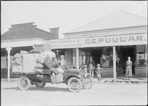 Pullar Shop with truck, Capella Street, Clermont, Queensland, ca. 1920 [picture] / Gordon Cumming Pullar