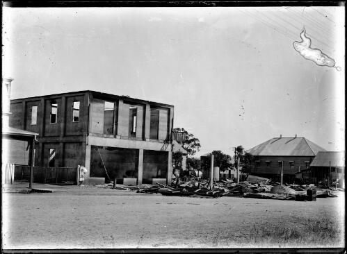 Fire wreckage west side of Capella Street from southeast, Clermont, Queensland, 1923 [picture] / Gordon Cumming Pullar
