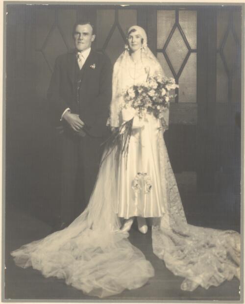Wedding portrait of Dorothy May Hackett (née Burt) and James ('Jim') Gaythorne Hackett, Melbourne, Victoria, 23 August 1930 [picture] / Ruskin, Melbourne
