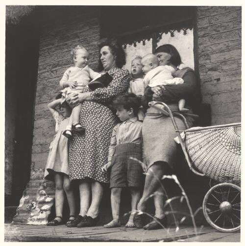 Families awaiting eviction, 1945 [picture] / Geoffrey Powell