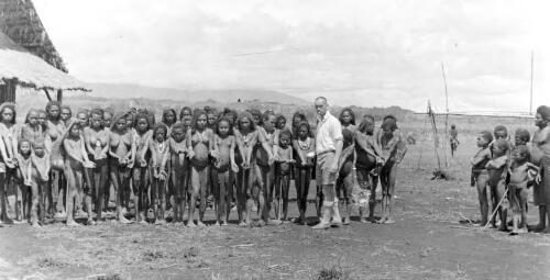 Divine Word Mission, Mount Hagen, 1934, showing A.J. Bearup cleaning people's arms for TB skin tests [picture] / [G. Heydon]