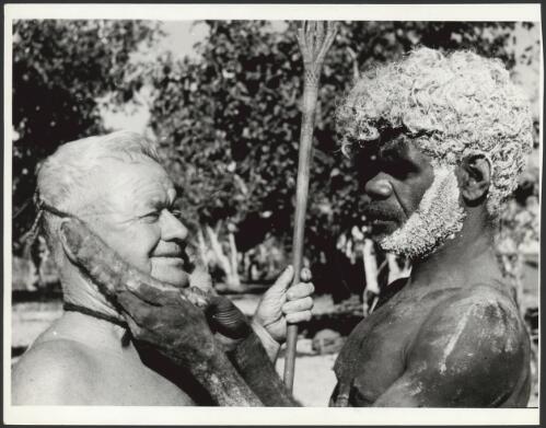 [Bill Harney being decorated by a Tiwi Islander man for Pukamani ceremony, Melville Island, 1954] [picture]