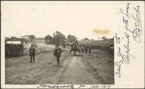 Two unidentified men men on a road, Stradbroke Island, November 1919 [picture]