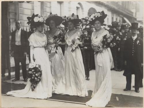 [Four bridesmaids waiting at the entrance to St Margaret's, Westminister ] [picture]