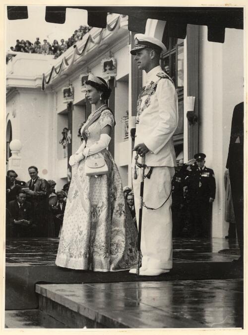 [Her Majesty Queen Elizabeth the Second and His Royal Highness The Duke of Edinburgh, standing on front steps of Parliament House, Canberra 1954] [picture]