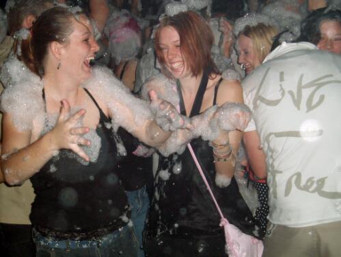 Young people dancing in soap foam, Academy nightclub at the event Foam party, Civic, Canberra, 24 March 2005 [picture] / James Campbell