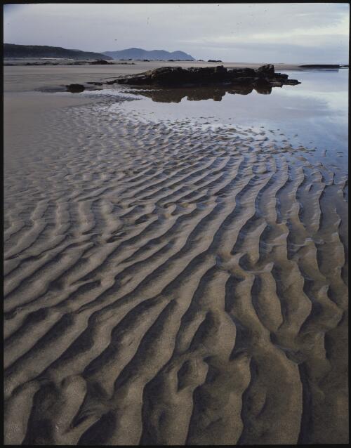 Low tide, south coast, southwest Tasmania, 1990? [transparency] / Peter Dombrovskis