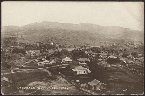Aerial view of cemetery, houses and  Mount Morgan, Queensland, ca.1915 [picture]