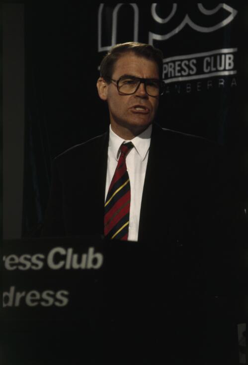 Portrait of John Faulkner at the sports debate, National Press Club, Canberra, 23 February 1996, 1 [transparency] / James Nomarhas