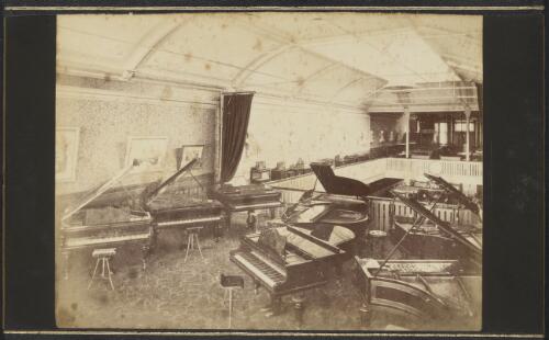 Grand pianos on display at the Nicholson and Company music store, Melbourne, ca. 1880 [picture] / J.W. Lindt