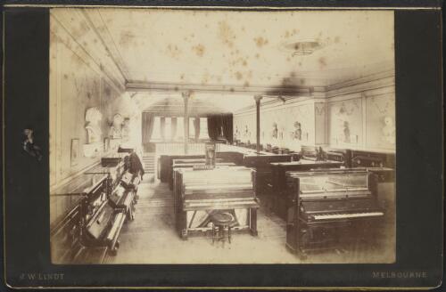 Upright pianos displayed on the first floor at the Nicholson and Company music store, Melbourne, ca. 1880 [picture] / J.W. Lindt