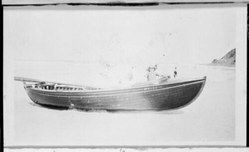 Unidentified child in a boat on the beach at Burleigh Heads, Queensland, ca. 1930s [picture]