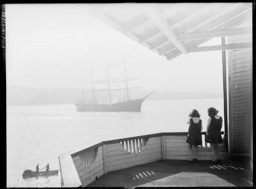 Adelie and Toni Hurley looking out over Rose Bay, Point Piper, Sydney, 1927 [picture] / Frank Hurley
