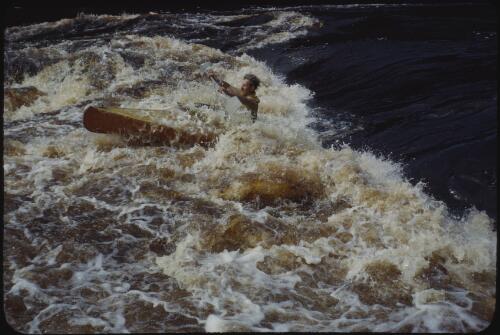 Olegas Truchanas in kayak, dolerite gorge, Pieman River, Tasmania, 1962? [transparency] / Peter Dombrovskis