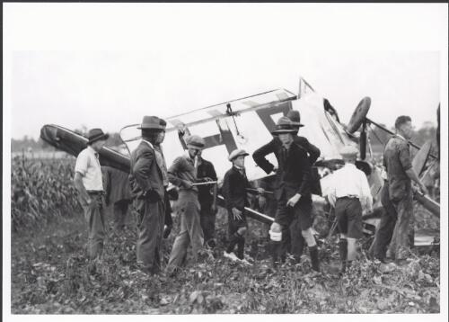 The wreckage of Amy Johnson's DH Moth, after a misjudged landing at Eagle Farm, Queensland, 1930 [picture] / Cliff Postle