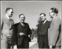 Bill Riordan, John Rosevear, Arthur Calwell and Eddie Ward outside Parliament House, Canberra, ca. 1945, 1 [picture] / Department of Information