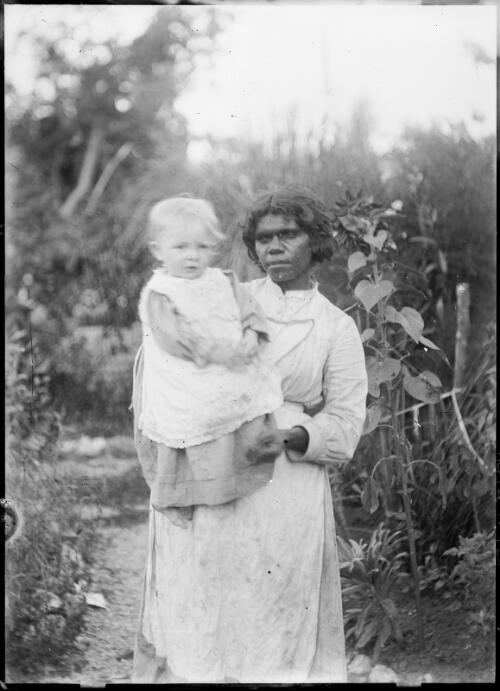 Woman holding a small child in a garden, Australian Capital Territory, ca. 1887 [picture]