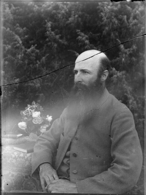 George De Salis seated in the garden, Cuppacumbalong, Australian Capital Territory, ca. 1893 [picture]