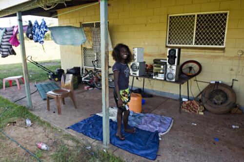 A Yolngu girl on her family's back porch, Maningrida, Arnhem Land, Northern Territory, 23 April 2010 [picture] / Dave Tacon