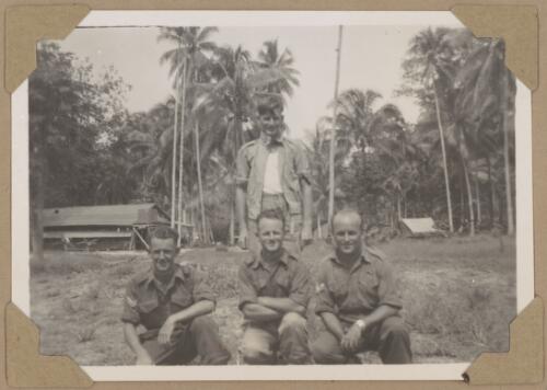 Mess staff at General Robertson's mess, Jacquinot Bay, New Britain Island, Papua New Guinea, 1945 [picture] / Alfred Amos