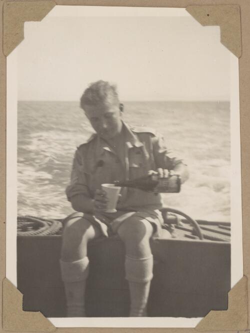 Fred on the launch en route to Green Island, Queensland, August 1945 [picture] / Alfred Amos