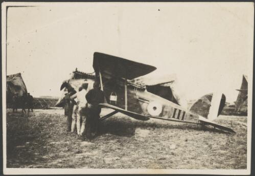 Airmen of 3 Squadron, Australian Flying Corps, examining a captured German Halberstadt CL.II biplane with British markings, Flesselles airfield, France, 1918 [picture] / John Joshua