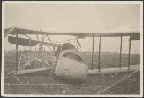 Front view of a crashed Airco DH.1 pusher biplane, England, 1917 [picture] / John Joshua