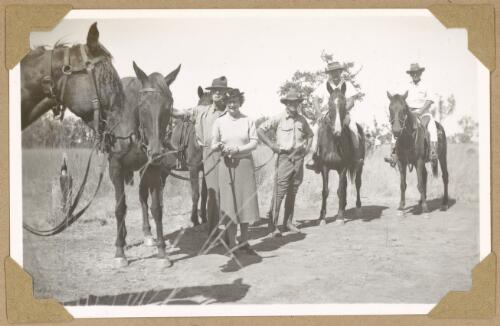 Miss Elliot with the head stockman and stockmen, Augustus Downs, Queensland, 1946 [picture] / Alfred Amos