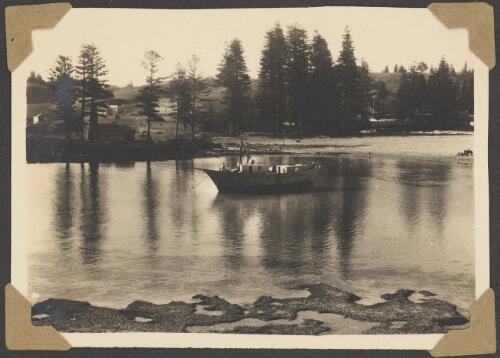 Small boat moored in Emily Bay [?], Norfolk Island, 1946 [picture]