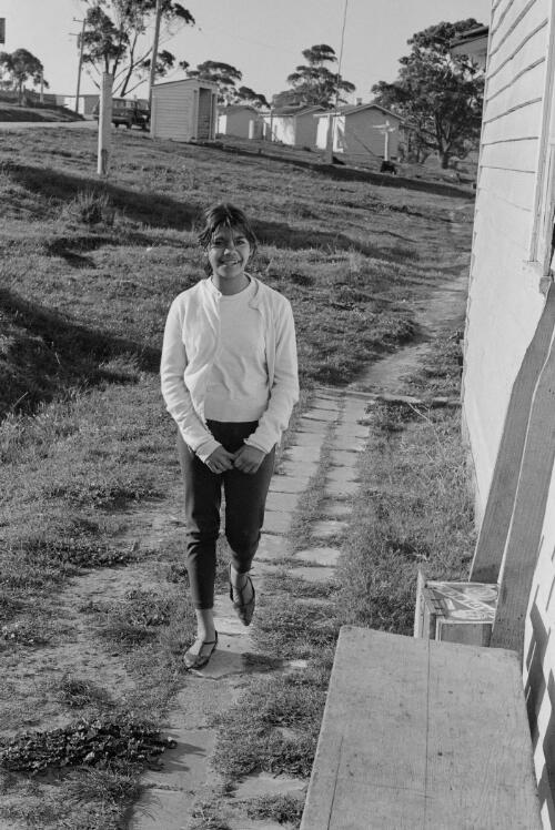 Doreen Bull, a high school student outside her home at Lake Tyres Mission, Victoria, ca. 1965 [picture] / Albert W. Brown