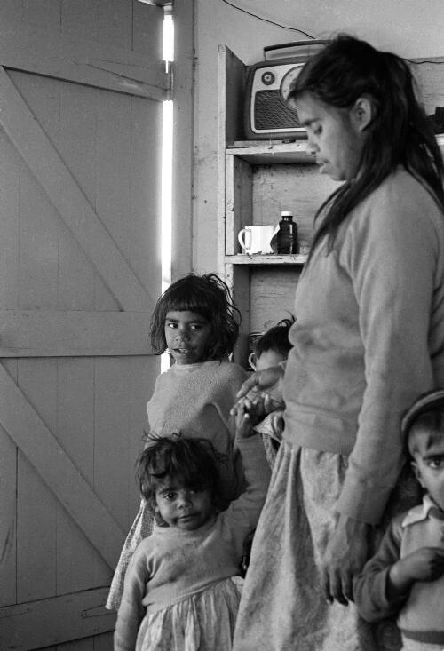 Mrs Edwards with four Aboriginal children at Lake Tyres Mission, Victoria, ca. 1965 [picture] / Albert W. Brown