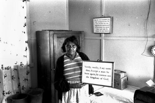 An Aboriginal women in her home at Lake Tyres Mission, Victoria, ca. 1965 [picture] / Roy McDonald