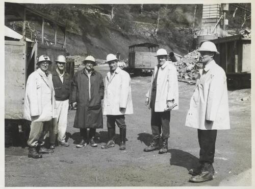 Five workmen and Sir Edric Bastyan, Govenor of South Australia, visiting the Snowy Mountains Hydro-Electric Scheme project, New South Wales, 1963? [picture] / Thiess Bros Pty Ltd