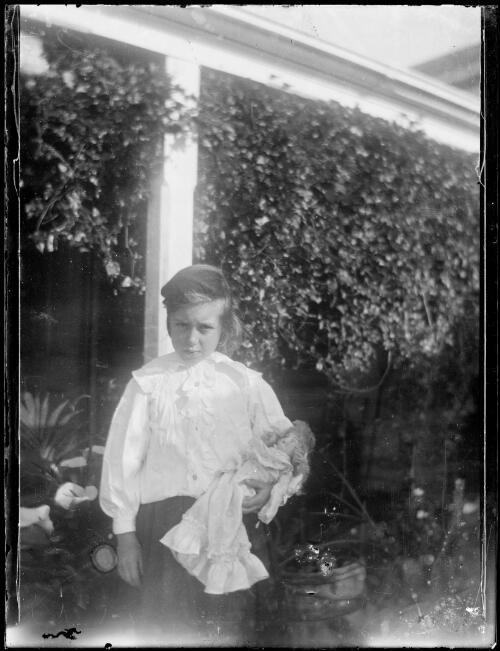 Stella holding a doll, Yathella, New South Wales, ca. 1915 [picture] / Abraham Valentine Booth