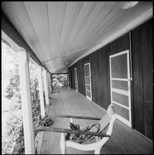 View along verandah of Mundoolun Homestead, Beaudesert, Queensland, ca. 1970 [picture] / Wes Stacey
