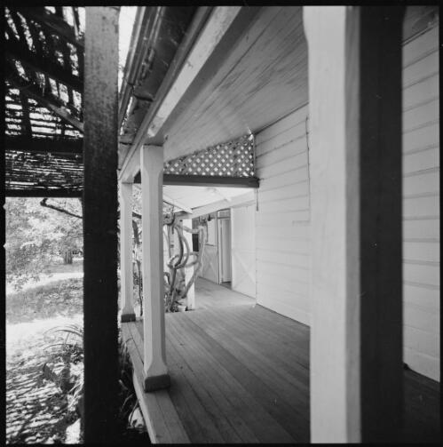 Linking verandah of Mundoolun Homestead, Beaudesert, Queensland, ca. 1970 [picture] / Wes Stacey