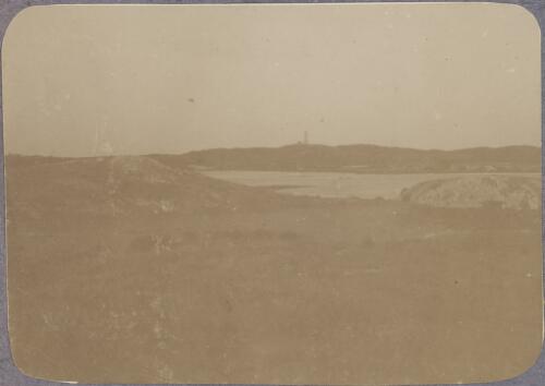 View of a salt lake with a lighthouse in the distance, Rottnest Island, Western Australia, ca. 1915 [picture] / Karl Lehmann