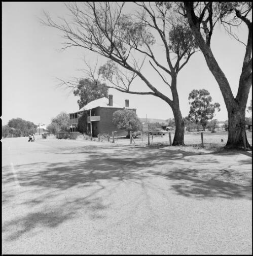 Two storey brick house viewed from across main street, York, Western Australia, ca. 1970, 2 [picture] / Wes Stacey
