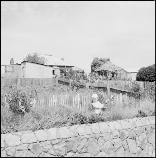 Garden behind a stone wall, Oatlands, Tasmania, ca. 1970 [picture] / Wes Stacey
