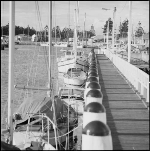 Boats moored along the wharf at Port Fairy, Victoria, ca. 1970 [picture] / Wes Stacey