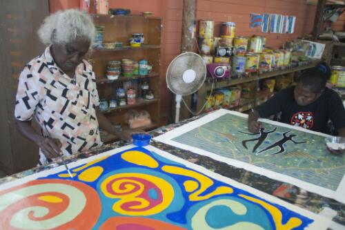 Elizabeth Queenie Gilbert and Evelyn Sandy, at work on new canvases at the Lockhart Rivert Art Centre, Lockhart River, Cape York, Queensland, 19 October 2010 [picture] / Dave Tacon