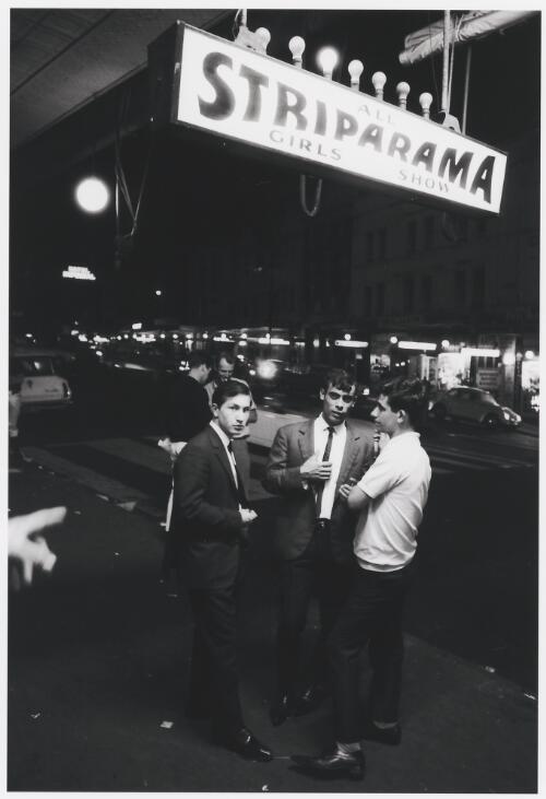 Young men outside the Striparama club, Kings Cross, Sydney, 1964 / Robert McFarlane